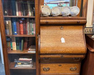 Beautiful unique Oak Secretary with book shelves and unique hidden drawers. Wonderful old books for you to choose from