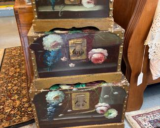 Set of 3 decorative trunks. Notice nice rug