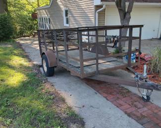 Trailer w side rails and drop down ramp