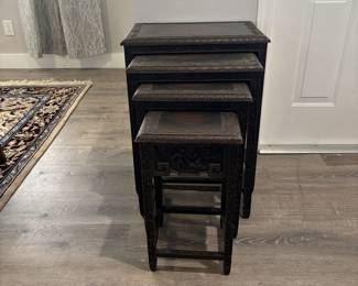 Hand carved Chinese nesting tables.