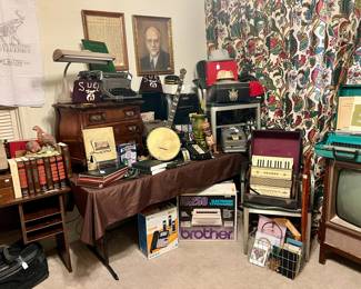 ACCORDIAN, BANJO, BOOKS, TYPEWRITERS.