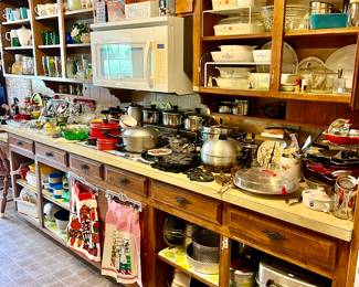 LONG GALLEY KITCHEN WITH VINTAGE ON BOTH SIDES.