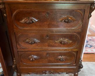 Carved chest of drawers