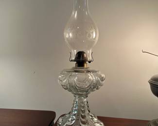 C46 - $15. Eagle Brand Oil Lamp. Measures 19" tall.