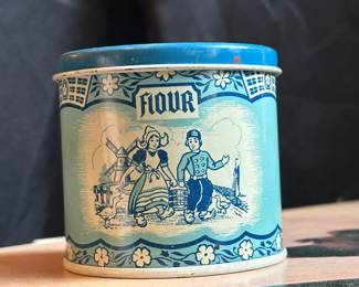 C127 - $40. 1950s Nesting Childs Toy Canister Set. (Wolverine Tin Litho Blue & White Dutch Canister Set Flour, Sugar, Coffee & Tea.)