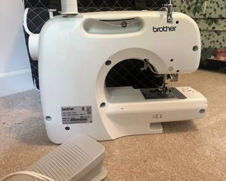 C126 - $60. Brother Sewing & Quilting Machine with Carrying Case on Wheels. Model CS6000i. 60 Built in Stitches.