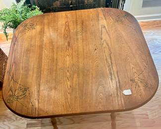 C25 - $80. Wooden Drop Leaf Table. Measures 40" x 35.5" x 29.25" tall. (Has 2 chairs with matching design. Included if you want them but they have been stored in the attic so the finish isn't as nice as the table)