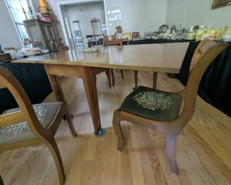 C146 - $275. Jordan Furniture Drop Leaf Table. Solid Walnut Table & Chairs. When leaves are down it measures 25.5" x 48" x 30" tall. Each leaf adds 25.25" when up. VERY HEAVY - sturdy table. Overall very good vintage condition. Has some scratches - photographed.