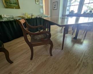 C146 - $275. Jordan Furniture Drop Leaf Table. Solid Walnut Table & Chairs. When leaves are down it measures 25.5" x 48" x 30" tall. Each leaf adds 25.25" when up. VERY HEAVY - sturdy table. Overall very good vintage condition. Has some scratches - photographed.