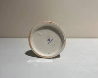 C138 - $10. "Chimney Sweep" Hummel. Measures 4" tall. (manufactured 1940-1959) Some crazing on the base.