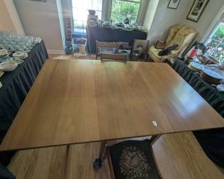 C146 - $275. Jordan Furniture Drop Leaf Table. Solid Walnut Table & Chairs. When leaves are down it measures 25.5" x 48" x 30" tall. Each leaf adds 25.25" when up. VERY HEAVY - sturdy table. Overall very good vintage condition. Has some scratches - photographed.