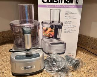 C87 - $40. Cuisinart Elemental 8 Food Processor. Appears that it has been gently used and placed back in box.
