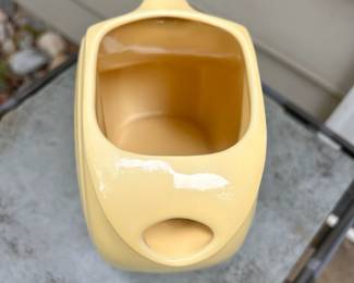 C99 - $25. Yellow Fiesta Disc Pitcher. Large 67 oz size. Measures 8" x 7.35" x 4.75" wide.