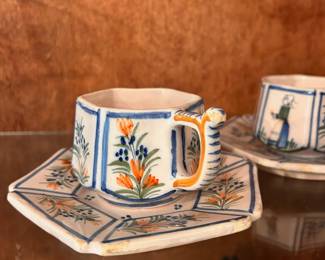 C98 - $25. Pair of Vintage Henriot Quimper Man & Woman Tea Cups & Saucers. Cups are 6 sided and 2.25" tall. Saucers are 5.5" in diameter.