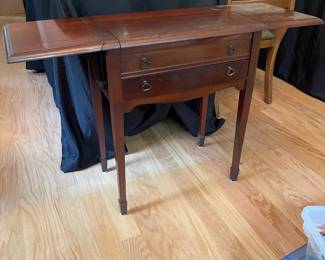C114 - $100. Oneida Anti-Tarnish Drop leaf cabinet. Measures 22.5" wide (40.5" when open) x 13" deep x 26" tall.