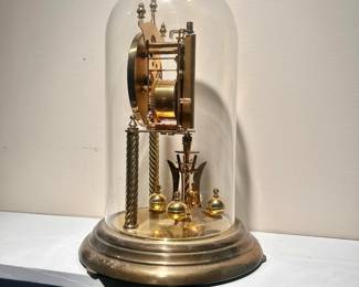 C30 - $40. Kundo 400 day Clock. Measures 11.5" tall x 7" wide. Has original key & paperwork in envelope.