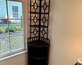 C45 - $75. Wooden Corner Shelf. Measures 18" wide x 57.5" tall.