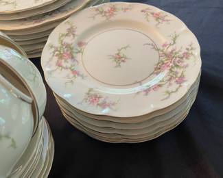 C38 - $140. Theodore Haviland New York "Rosalinde". Serving Platter, 7 dinner plates, 2 salad plates, 6 dessert plates, 7 teacup/saucers, creamer, sugar bowl (no lid), gravy dish. No chips/ cracks noted.