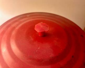 C135 - $200. 1950's Golden Flake Country Store Counter Jar with Red Metal Lid. Measures 12" tall x 9.5" wide. (Octagonal finial has a chip which is shown in the pictures)
