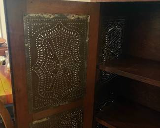 C108 - $300. Antique Pie Cabinet with Tin Punched Doors & Sides. Measures 29.5" wide x 14" deep x 57" tall.