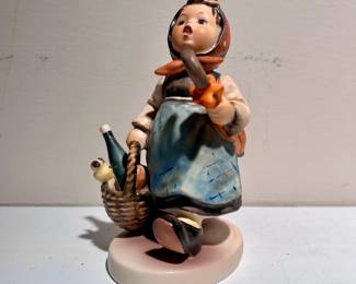 C140 - $10 Goebel Hummel "Visiting an Invalid". Measures 5" tall.