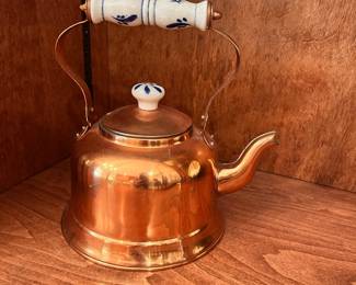 C102 - $20. Vintage Copper Kettle with Delft Blue Handle. Measures 8.75" tall x 8" wide.