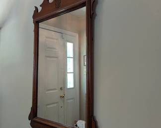 C33 - $65. Hanging Wall Mirror - solid wood frame in excellent condition. Measures 17.5" wide x 33" tall.