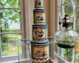 C127 - $40. 1950s Nesting Childs Toy Canister Set. (Wolverine Tin Litho Blue & White Dutch Canister Set Flour, Sugar, Coffee & Tea.)