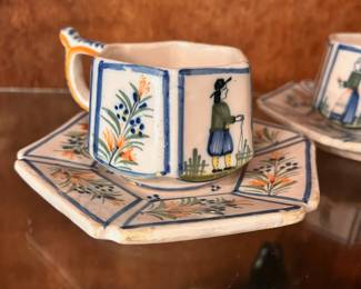 C98 - $25. Pair of Vintage Henriot Quimper Man & Woman Tea Cups & Saucers. Cups are 6 sided and 2.25" tall. Saucers are 5.5" in diameter.
