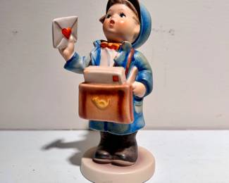C139 - $10. Vintage Goebel Hummel "Postman" #119. West Germany. Measures 5.5" tall.