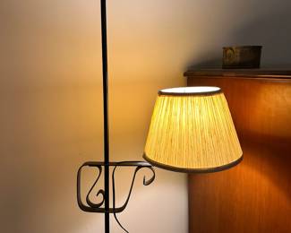 C80 - $50. Vintage Wrought Iron Floor Lamp with adjustable swing arm. Lamp shade is in good condition. Measures 55.5" tall.