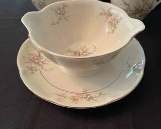 C38 - $140. Theodore Haviland New York "Rosalinde". Serving Platter, 7 dinner plates, 2 salad plates, 6 dessert plates, 7 teacup/saucers, creamer, sugar bowl (no lid), gravy dish. No chips/ cracks noted.