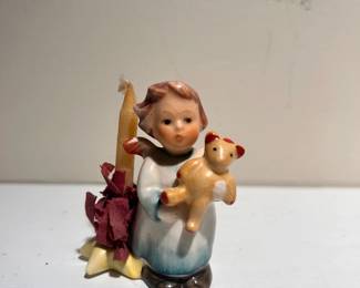C142 - $10. Hummel "Angel with Teddy Bear" and candle holder. Measures 2.5" tall.