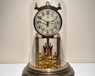 C30 - $40. Kundo 400 day Clock. Measures 11.5" tall x 7" wide. Has original key & paperwork in envelope.