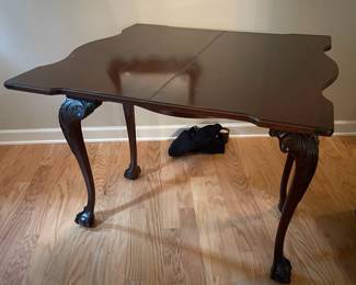 C32 - $145. Huntley Simmons Flip Top Table. Single drawer slides easily. Open it measures 35.5" wide x 37" deep x 30.5" tall. Closed it is 18.5" deep.