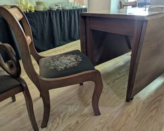C146 - $275. Jordan Furniture Drop Leaf Table. Solid Walnut Table & Chairs. When leaves are down it measures 25.5" x 48" x 30" tall. Each leaf adds 25.25" when up. VERY HEAVY - sturdy table. Overall very good vintage condition. Has some scratches - photographed.