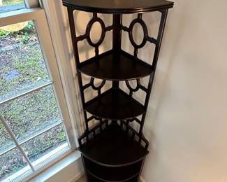 C45 - $75. Wooden Corner Shelf. Measures 18" wide x 57.5" tall.