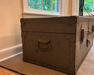 C63 - $75. Military Trunk. Measures 32" long x 16.25" deep x 13.25" tall.