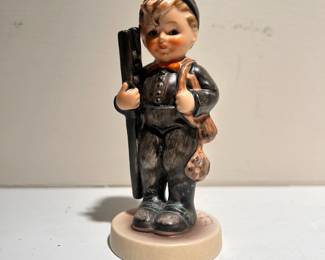 C138 - $10. "Chimney Sweep" Hummel. Measures 4" tall. (manufactured 1940-1959) Some crazing on the base.
