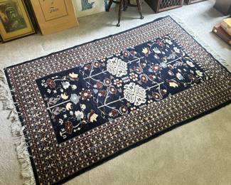 C49 - $75. Wool Rug - no tags. Measures 73" x 48".