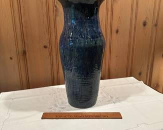 B45 - $30. Large Blue Pottery Floor Vase. Measures 17.5" tall.