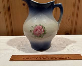 B105 - $30. Blue & White Stoneware Pitcher