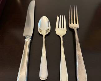 S2 - $1,300. S. Kirk & Son Sterling Flatware Set. 8 Knives, 8 Dinner Forks, 8 Salad Forks, 8 Spoons, 2 Serving Spoons, 1 serving knife.
