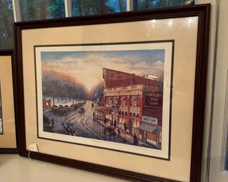 B135 - $60. MA Vessey signed and numbered print. "The Corner" Charlottesville VA. #173/300. Measures 27" x 21" framed.