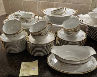B119 - $75. Noritake Rosemary China Set. Overall pieces are in great condition - 2 with chips.