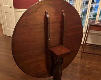 B146 - $50. Vintage Tilt Top Table. Measures 29.5" round x 29.5" tall. Does not have the pin to hold the table flat - so it needs a minor repair.