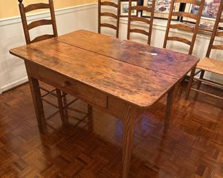 B151 - $550. Antique 2 Plank Farm House Table with Single Drawer. Measures 34" x 50.5" x 30.75". (6 Chairs priced separately for $400 - but do fit with the table)