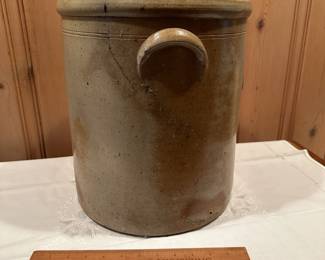 B44 - $50. Large Stoneware Crock. Measures 12" wide x 13.5" tall. Great Display Piece - does have a crack.