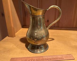 B67 - $30. Brass Pitcher.