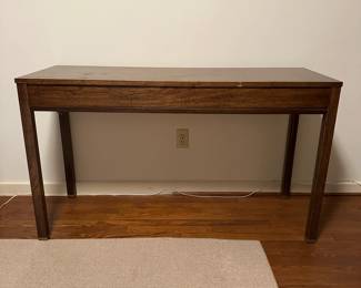 Desk. Top does show signs of wear - but sturdy. Measures 50" long x 18" deep x 29" tall.